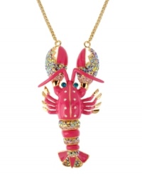 Rock lobster. Betsey Johnson brings a sandy outlook with this cute pink lobster pendant embellished with crystal accents and gold tone details. Crafted in antique gold tone mixed metal. Approximate length: 26 inches + 3-inch extender. Approximate drop length: 5-1/2 inches. Approximate drop width: 3 inches.