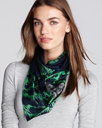 This fiercely fashionable silk scarf depicts a neon snow leopard donning a Juicy Couture logo collar.