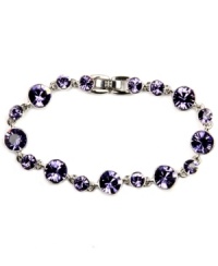 Customize your look with a flexible fit and glam glass accents. Regal, violet hues give purpose to Givenchy's stunning bracelet. Set in silver-plated mixed metal. Approximate length: 7-1/4 inches.