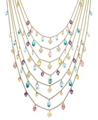 Attract a little attention. Lauren by Ralph Lauren's dramatic 7-row necklace features charms in reconstituted turquoise and glass in a range of pastel hues. Set in gold tone mixed metal. Approximate length: 22 inches to 37 inches.