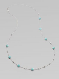 Mini ball accented sterling silver link chain with rich, faceted turquoise stone stations. TurquoiseSterling silverLength, about 38Lobster clasp closureImported 