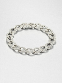 Tapered leaf-shaped links, encrusted with pavé crystals, form an elegantly simple chain bracelet with endless sparkle.CrystalRhodium platingLength, about 7¼Width, about ½Box-and-tongue claspImported