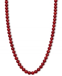 Crimson chic. This brilliantly-hued strand necklace features bold red agate beads (190 ct. t.w.) in a polished 14k gold setting. Approximate length: 18 inches. Approximate bead diameter: 8 mm.