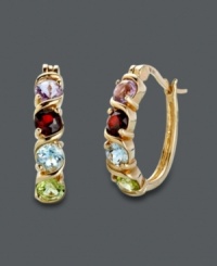 Playful color amps up the traditional hoop earring. Victoria Townsend earrings highlight round-cut garnet (5/8 ct. t.w.), amethyst (5/8 ct. t.w.), peridot (1/2 ct. t.w.), and blue topaz (5/8 ct. t.w.). Crafted in 18k gold over sterling silver. Approximate diameter: 7/8 inch.