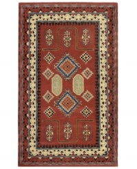 Southwestern style comes to your home with distinctive rug, inspired by ancient tribal designs. Hand-crafted with meticulous attention to detail, the rug features grandly scaled medallions in a mix of beige and rust-red colorways.