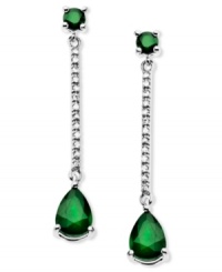 Glamorous green. These stunning sterling silver drop earrings highlight round and pear-cut emerald (1-9/10 ct. t.w.) and sparkling diamond accents. Approximate drop: 1-1/4 inches.