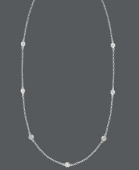 Sparkle by the inch. 11 stations of round-cut cubic zirconias (9/10 ct. t.w.) adorn B. Brilliant's lovely sterling silver necklace. Approximate length: 24 inches.