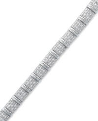 A shimmering statement. This bold sterling silver bracelet sparkles with round and baguette-cut diamonds (2 ct. t.w.) and is sure to leave a lasting impression at any formal affair. Approximate length: 7-1/4 inches.