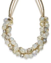 Add effervescent style with this bubbly necklace. This c.A.K.e. by Ali Khan design features opal-tone glass beads strung from a gold tone mixed metal chain. Approximate length: 18 inches + 3-inch extender. Approximate drop: 1 inch.