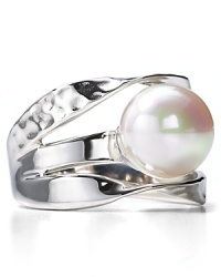 An eye-catching ring from Majorica. Man-made pearl set among contoured bands of polished and hammered sterling silver.