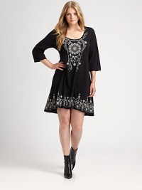 Pretty embroidery adds whimsy to this cotton shift dress with a modern hi-lo hem.U-neckElbow-length sleevesHi-lo hemAbout 36 from natural waistCottonMachine washImported