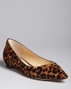 IVANKA TRUMP lends her sophisticated touch to exotic, leopard-print calf hair flats. Stylish pointed toes update them for this season.