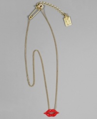 Finish your look with a sparkling kiss. This RACHEL Rachel Roy necklace features a crystal-accented lip charm and safety pin closure with logo chain. Set in mixed metal with a worn goldtone finish. Approximate length: 15 inches + 2-inch extender. Approximate charm diameter: 1 inch.