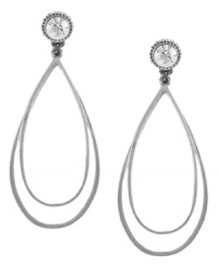 The bold and the beautiful. Large doubled teardrops add depth to Jessica Simpson's glass-accented post earrings. Set in satin rhodium-plated mixed metal. Approximate drop: 2-1/2 inches.