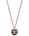 A rosy pendant with subtle sparkle. Emporio Armani's stainless steel pendant features a rose-gold and brown ion-plated circular design with a vertical bar crystallized with light peach Swarovski elements. Accented with a dark brown lacquer and satin finish. Crafted in stainless steel. Approximate length: 17 inches + 2-inch extender. Approximate drop: 1-3/4 inches.