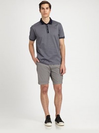 Regular-fitting, solid shorts are highlighted with slanted front, rear flap pockets and a side cargo pocket for a utilitarian feel, rendered in breathable, lightweight cotton for endless comfort.Flat-front styleSide slash, back flap pocketsFront coin, side cargo pocketInseam, about 9CottonDry cleanImported