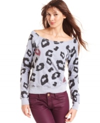 Kicking back never looked so good! Sugar Rush's comfy sweatshirt features a cool leopard print, exaggerated boat neck design and all of the sass you can handle.