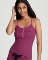 Wear stripes to sleep in Juicy Couture's racerback tank with cute buttons and a heart charm detail.