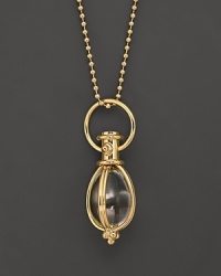 Oval rock crystal amulet. Designed by Temple St. Clair.