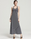 Stacked stripes zigzag the length of this DKNY maxi dress for a graphic take on the nautical trend. Team with retro sunglasses and sky-high wedges for a standout ensemble.