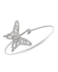 Flights of fancy. Exquisitely crafted in clear Swarovski crystal pavé, this Nightingale Bangle makes for effortless style inspired by nature. Crafted in silver tone mixed metal. Approximate diameter: 2-1/2 inches.