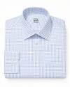 The shaded check pattern of this cotton dress shirt provides the perfect backdrop for a variety of tie designs. Or wear this button-down on its own for a polished look any day of the week.