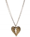 It's love at first flight with this pendant necklace from Betsey Johnson. Crafted from antique gold- and hematite-tone mixed metal, the necklace suspends two sparkling wings forming a heart shape. Item comes packaged in a signature Betsey Johnson Gift Box. Approximate length: 16 inches + 3-inch extender. Approximate drop: 1-3/4 inches.