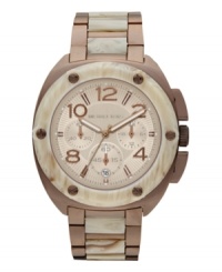 Natural tones blend with industrial structure on this original watch from Michael Kors.