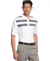 Kindle your plain polo collection with this bold stripe golf shirt by Greg Norman for Tasso Elba.