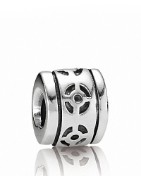 A decorative cutout design gives this sterling silver PANDORA charm artful appeal.