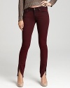 An unexpected tulip slit hem lends a unique and uber-chic look to these Rich & Skinny jeans updated in a deep, colorful wash.