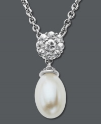 Sweet sophistication. Round-cut white topaz (6-1/2 ct. t.w.) and a cultured freshwater pearl (8 mm x 12 mm) form an elegant shape on this sterling silver drop pendant. Approximate length: 18 inches. Approximate drop: 9/10 inch.