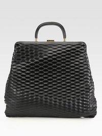 A roomy design in an edgy perforated leather style.Double top handles, 3¼ dropTop clasp closureSuede lining14¾W X 12½H X 2DMade in Italy