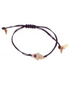 This RACHEL Rachel Roy bracelet showcases a hamsa hand charm with glass stone accents. An adjustable purple waxed cotton cord holds it all together. Set in rose-gold tone mixed metal. Approximate diameter: 1/4 inch. Adjustable from 1 inch to 7-1/4 inches.