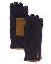 Add distinction and warmth to your cold weather repertoire with these classic luxe gloves from Polo Ralph Lauren.