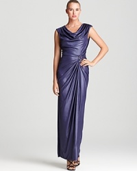 Soft draping lends elegance to this T by Tadashi gown, detailed with a sparkling crystal brooch.