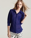 Whether worn with jeans or pencil skirts, this GUESS blouse lends sophisticated polish to every look.