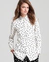 Get spotted in style with this polka dot patterned button-up from 10 Crosby Derek Lam. Keep your palate fashionably monochromatic for cutting-edge chic.