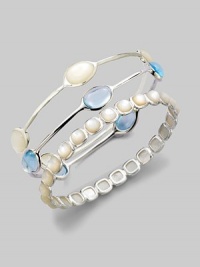 Five exquisite blue topaz cabochon stations set in sleek sterling silver. Blue topazSterling silverDiameter, about 2½Slip-on styleImported Please note: Bracelets sold separately. 