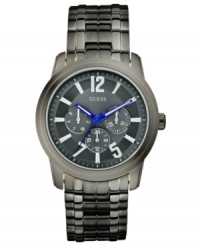 Set the tone for your day with this gunmetal-graced steel watch from GUESS.