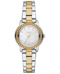 Golden accents and swirling rings of crystal accents prettify this classic steel watch from DKNY.