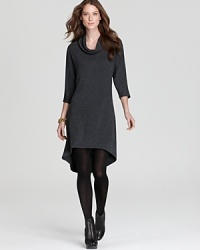 With an effortless silhouette and chic cowl neckline, this Three Dots dress makes elegance look easy. Slip a fax-fur vest over the style for a sophisticated spin.