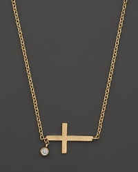 A delicate and modern necklace in yellow gold with diamond accent from Meira T.