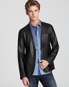 Designed by Elie Tahari for a luxurious and decidedly masculine look, this fetching blazer in all leather reveals your dark side in the most refined manner possible.