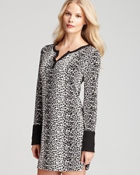 Sleep on the wild side in 40 Winks' snow leopard lounge shirt with an open v-neck and thermal trim.