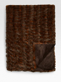 Decadently soft faux fur, designed and created in the USA of the most natural, authentic-looking fabrics. The rigorously inspected collectible is individually handcrafted and lined in velvet. 60 X 75AcrylicMachine washMade in USA