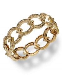 This glamorous bracelet from Charter Club is your link to on-trend fashion. Smoky topaz glass accents adorn a linked stretch design. Bracelet stretches to fit wrist. Crafted in gold tone mixed metal. Approximate diameter: 2-1/4 inches.