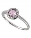 Pretty in pink. This stunning ring by CRISLU features an amethyst-colored, faceted cubic zirconia (5/8 ct. t.w.) accented by sparkling clear cubic zirconias. Set in platinum over sterling silver. Nickel-free for sensitive skin. Size 6, 7, and 8.