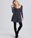 Day wear goes down to the disco with this Free People dress, in a metallic stretch knit with plenty of groove to spare.