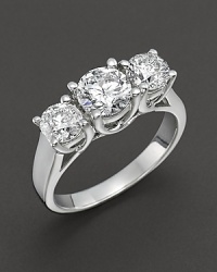 Triple stone diamond ring in white gold.